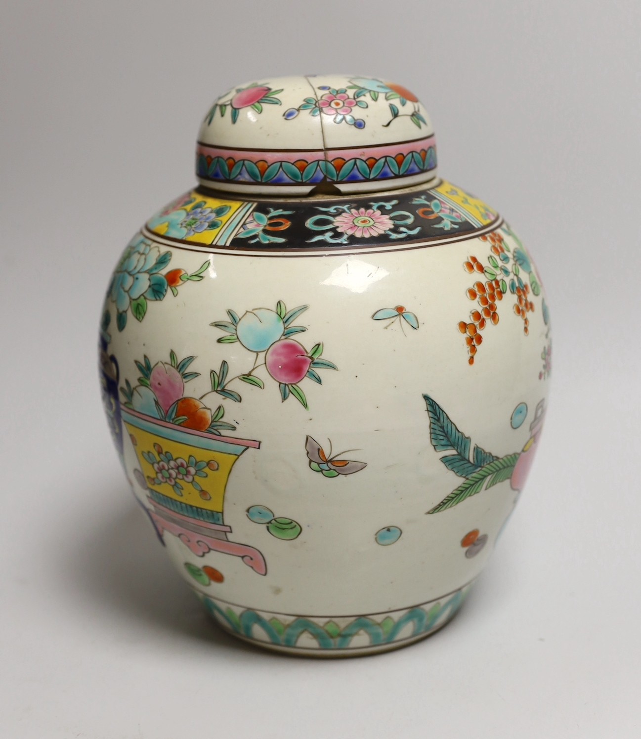 An early 20th century Japanese famille rose jar and cover, 23cms high